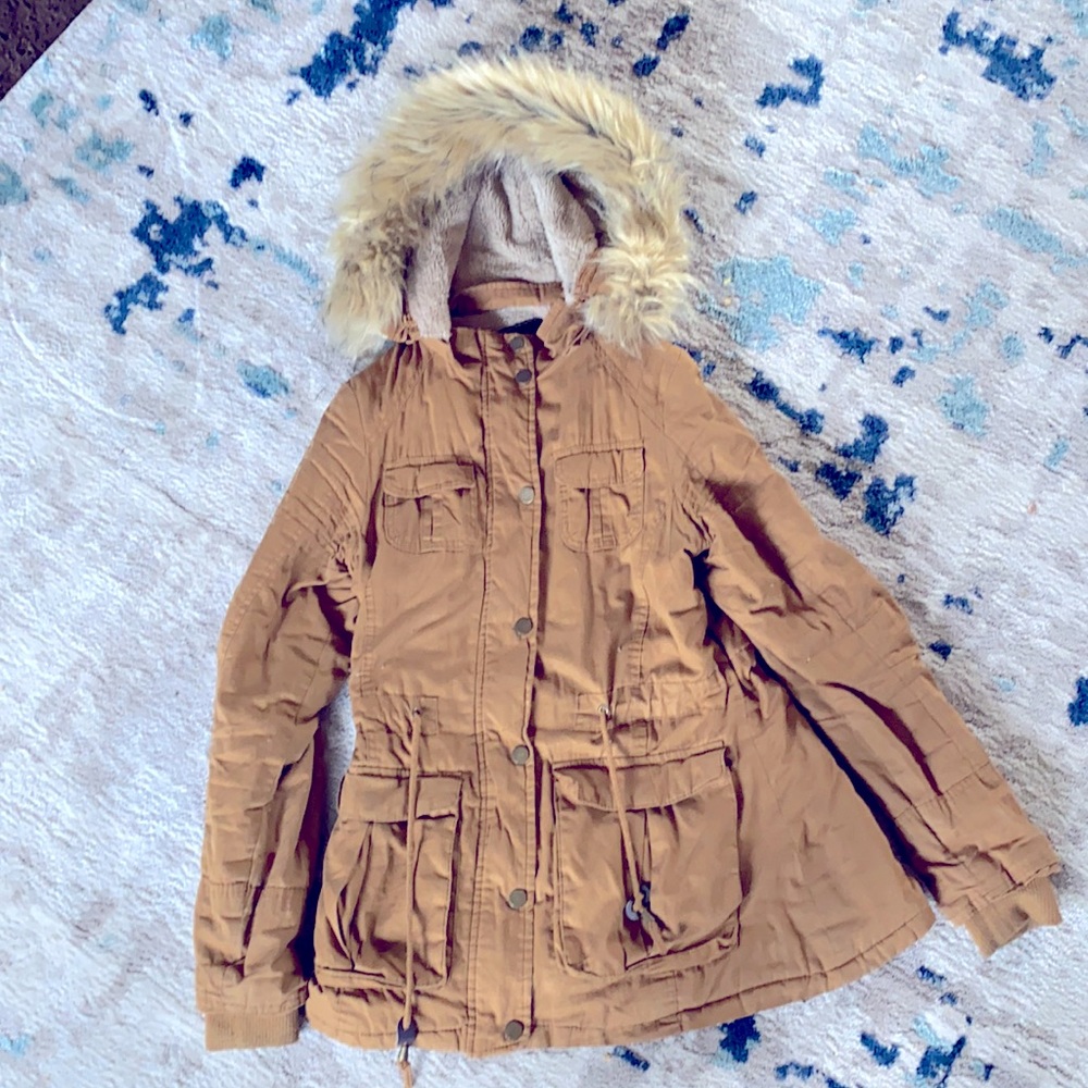 Woman’s hooded fur jacket